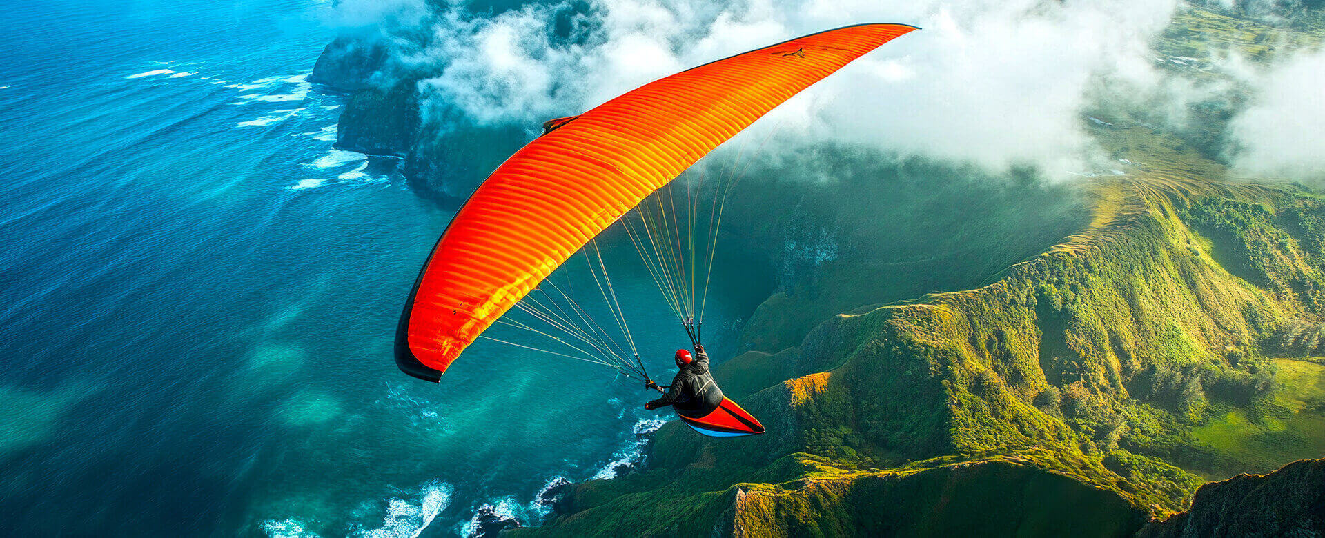 Paragliding over a tropical coastline